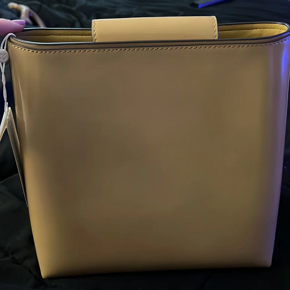 The brand is a Troy Butch, tan, in perfect condition. Never used - Picture 2 of 5